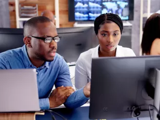 People working at computer