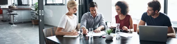 Group of colleagues collaborating in a boardroom